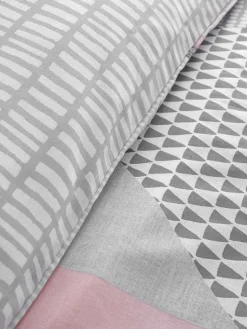 Catherine Lansfield Pink Larsson Geo Reversible Duvet Cover Set with Pillowcases