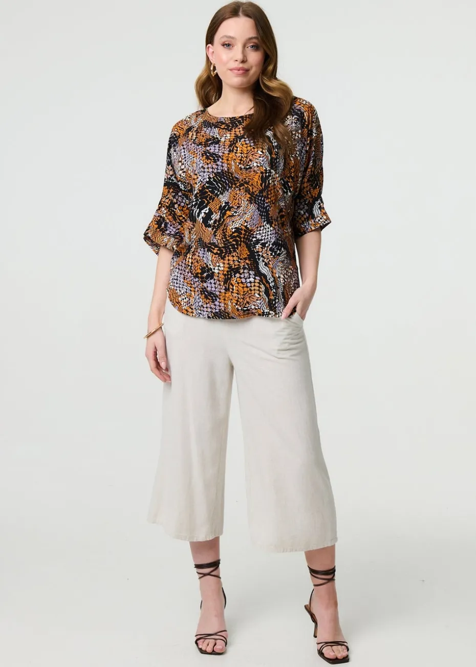 Izabel London Black Animal Print 3/4 Sleeve Relaxed Top