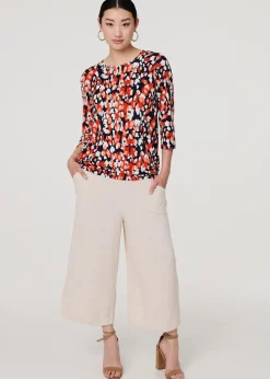 Izabel London Orange Printed Boat Neck Top