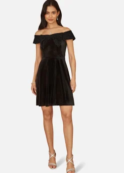 Mela Black Velvet Skater Dress With Sparkle Bow Neckline