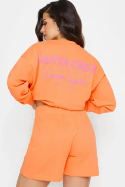 Pixiegirl Petite Orange 'Santa Cruz' Slogan Jogger Shorts