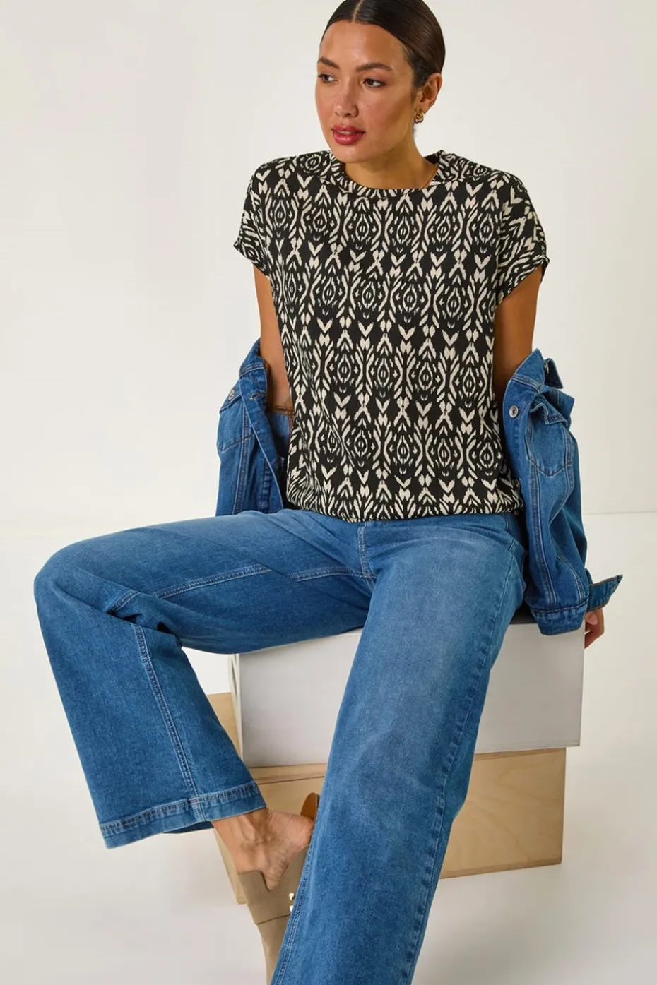 Roman Black Geometric Ikat Print Bubble Hem Top