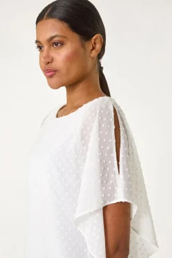 Roman Ivory Asymmetric Dobby Overlay Top