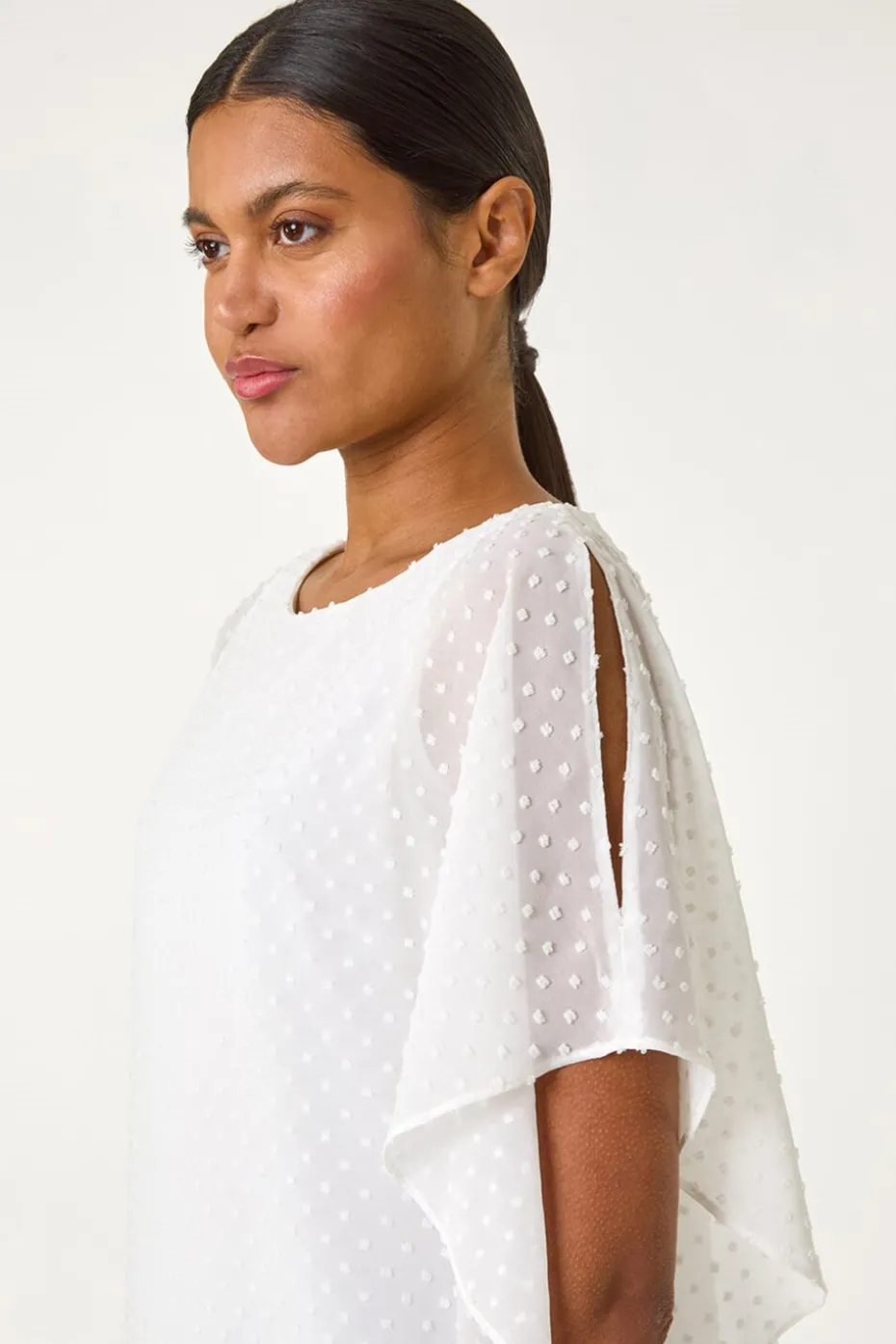 Roman Ivory Asymmetric Dobby Overlay Top
