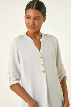 Roman Ivory Longline Bow Button Top