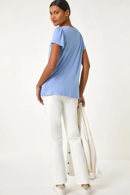 Roman Light Blue Daisy Trim Stretch Top