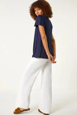 Roman Navy Daisy Applique Stretch Top