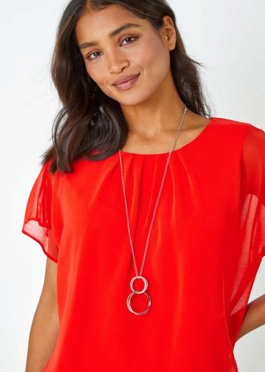 Roman Orange Chiffon Jersey Blouson Top with Necklace