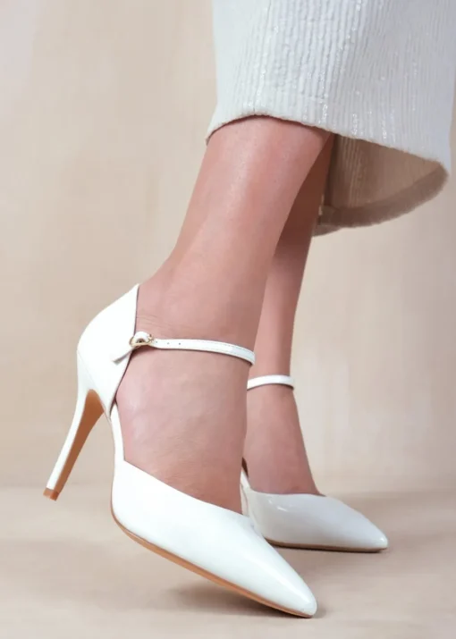 Where's That From Reflex White Patent Mid-High Pointed Toe Heels