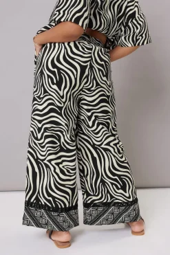 Yours Curve Black & White Zebra Wide Leg Trousers