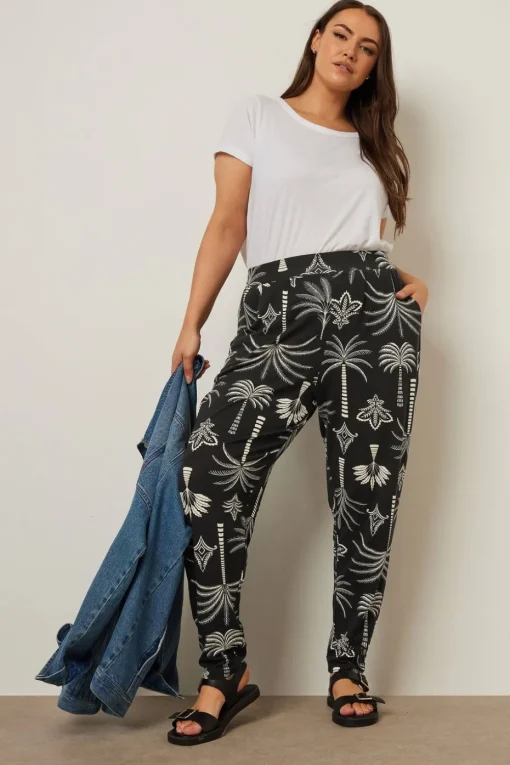 Yours Curve Black Palm Print Harem Trousers